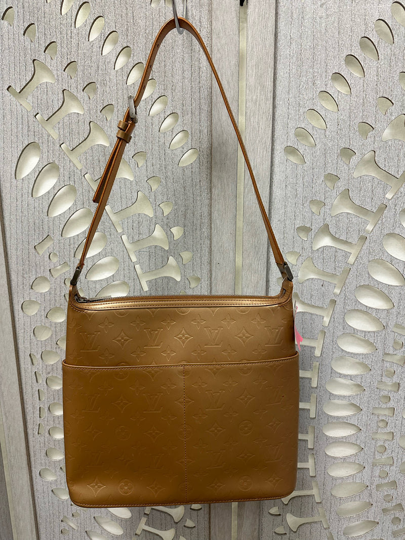 Louis Vuitton Leather Gold Monogram Mat Handbag